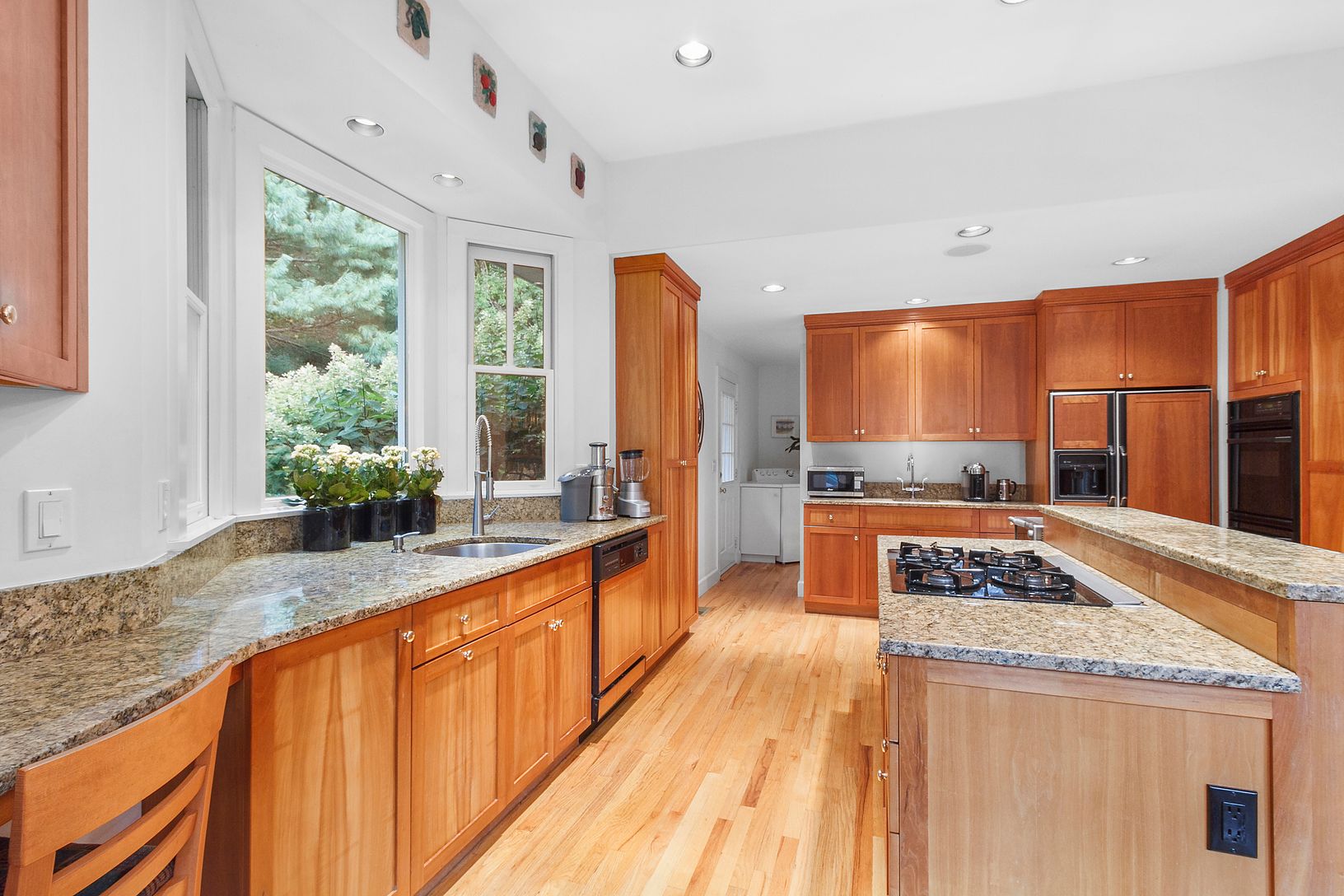  Cherry Cabinetry with Granite Countertops  