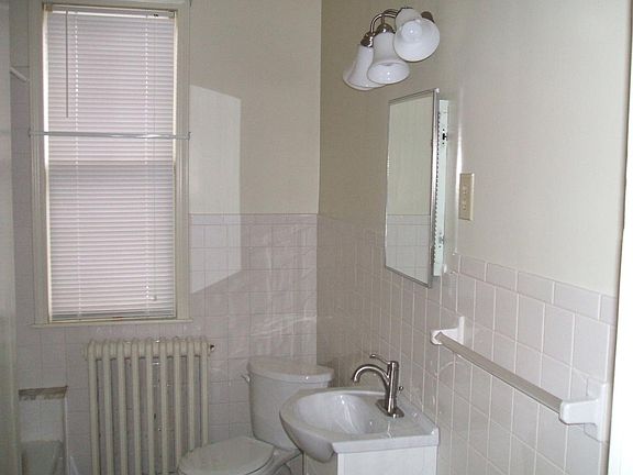 Bathroom with shower & tub large linen closet