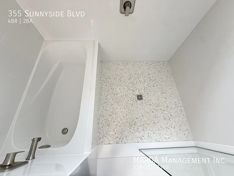 355 Sunnyside Blvd — Photo 65