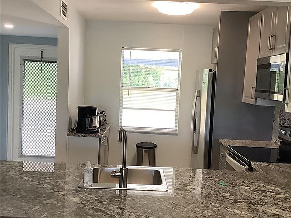 4th image of 7887 Golf Circle Drive #305