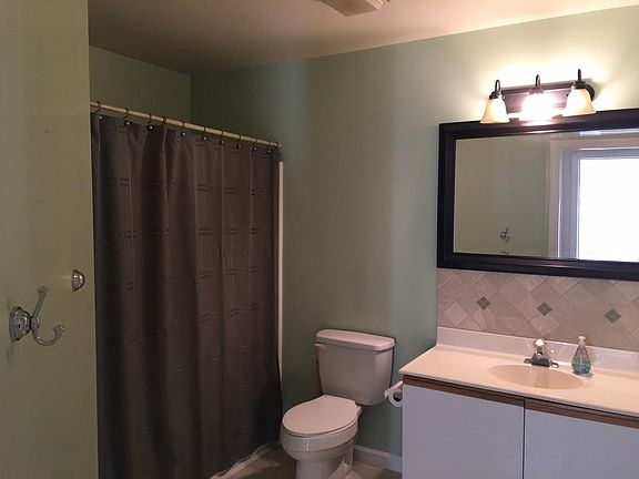 Full bath with washer/dryer (not seen in closet to the right of sink)