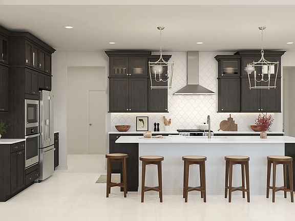 Kitchen with spacious island and pendant lighting