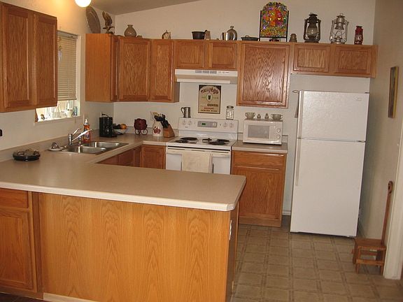 Kitchen w/ Plant Shelves