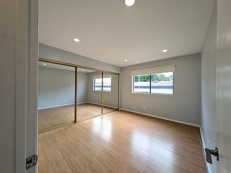2nd bedroom with new blackout blinds and recessed lightings