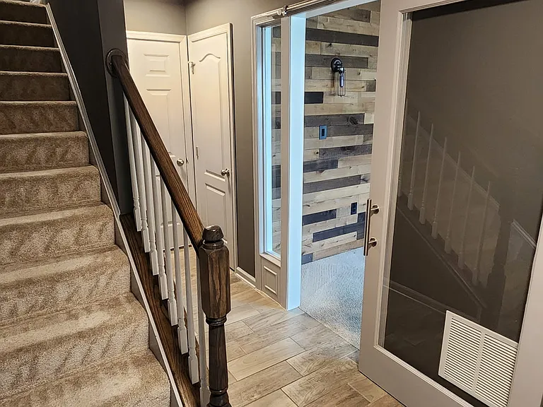 1st Level Entry w/ View of Den & door to garage