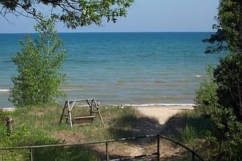 50' deeded sandy beach easement just steps away.