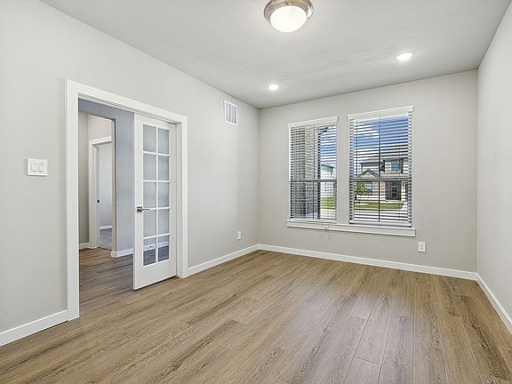 Study Home Office in the Hendrix home plan by Trophy Signature Homes - REPRESENTATIVE PHOTO