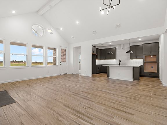 Great room with vaulted ceiling