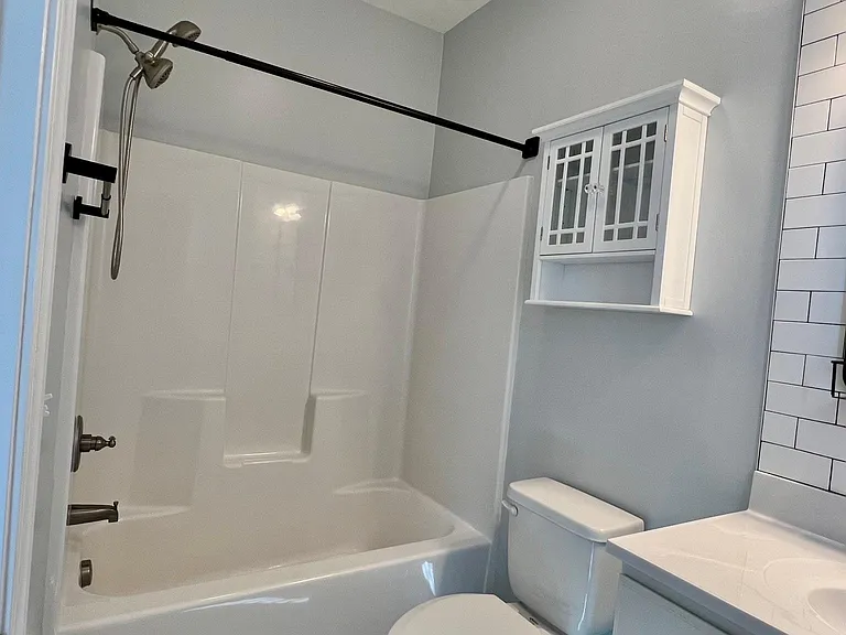 Upstairs secondary full bath.
