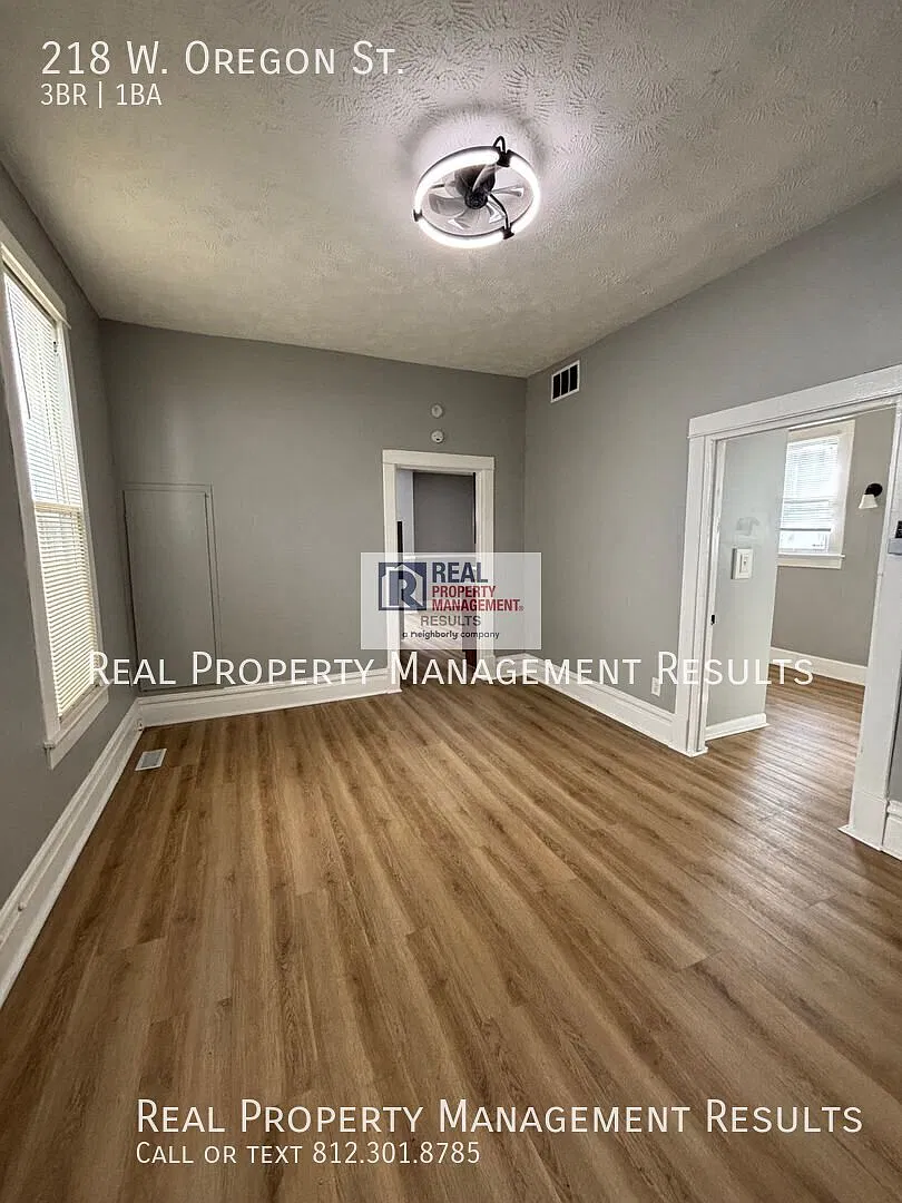 Versatile Home with Flexible Living Space & Fenced Backyard — Photo 2