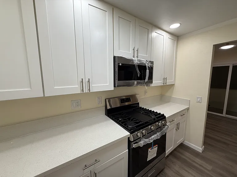 Kitchen with new stainless appliances
