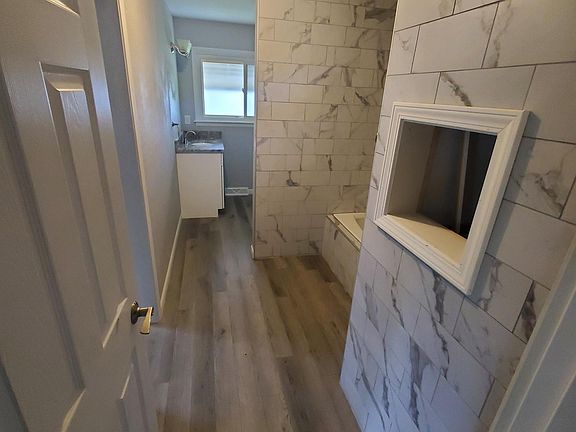 new tile shower & fixtures