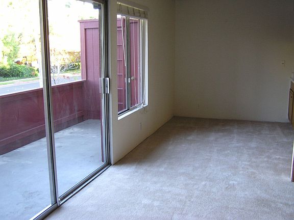 Dining area and slider to balcony