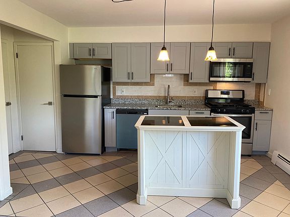 Brand new appliances. (dishwasher isn_t blue it_s the protective coating when shipped)