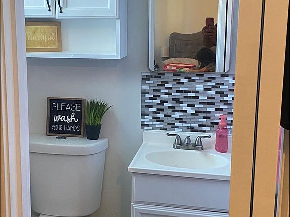 occupied please disregard personal items.