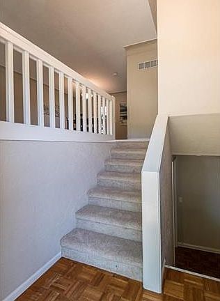 Home has been freshly painted and new carpet and laminate flooring installed.