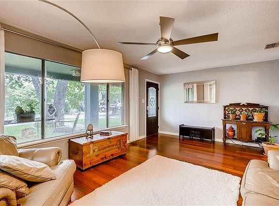 Feels as if one is bringing the outdoors in... w the wall of windows.