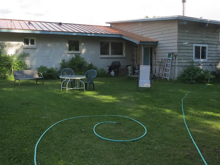 Back yard with outdoor clothes line