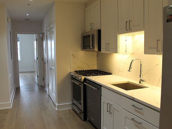 3rd image of 5110 Fort Totten Dr NE APT 4