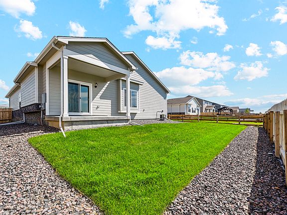 The back yard of the Pike is fully fenced-in.