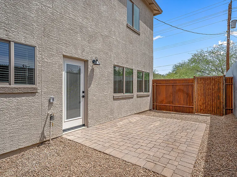 Backyard with Gate to Parking Area