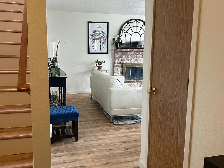 Left at the entry to the family room attached to the kitchen.