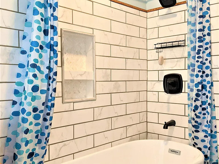 Soaking tub and shower combo