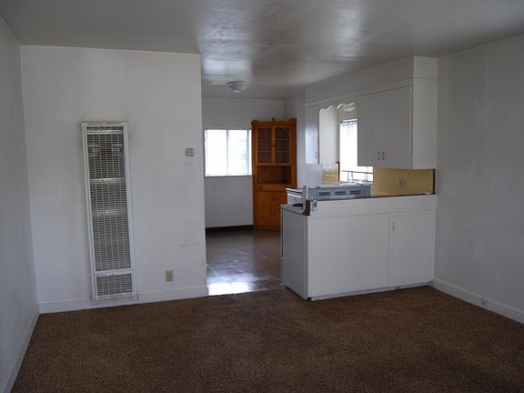 Living room looking to kitchen