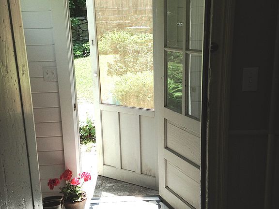 Back door to patio and yard