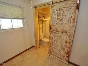 Sliding wooden barn door