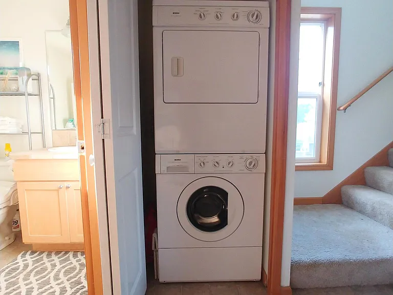 Washer/dryer neatly hidden in main floor hallway closet