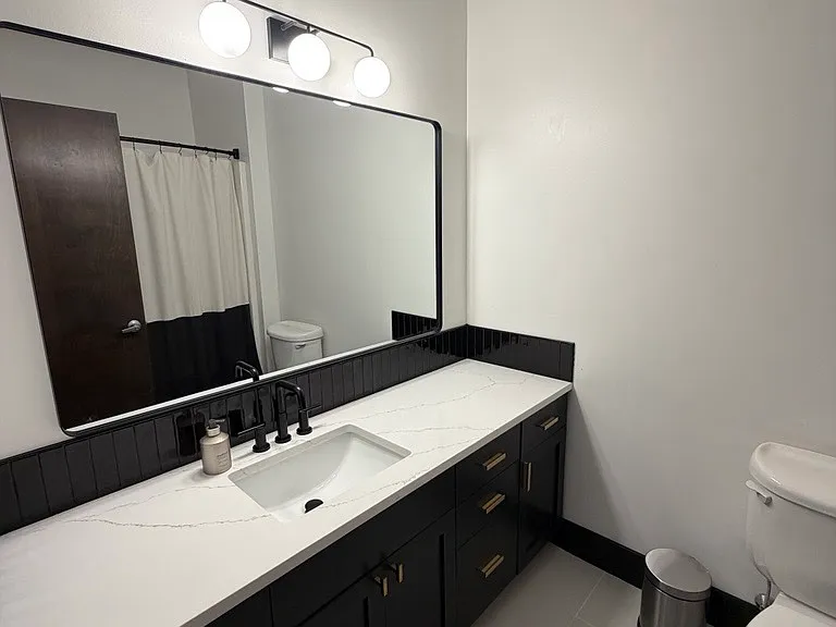 Master bath with full tub and shower