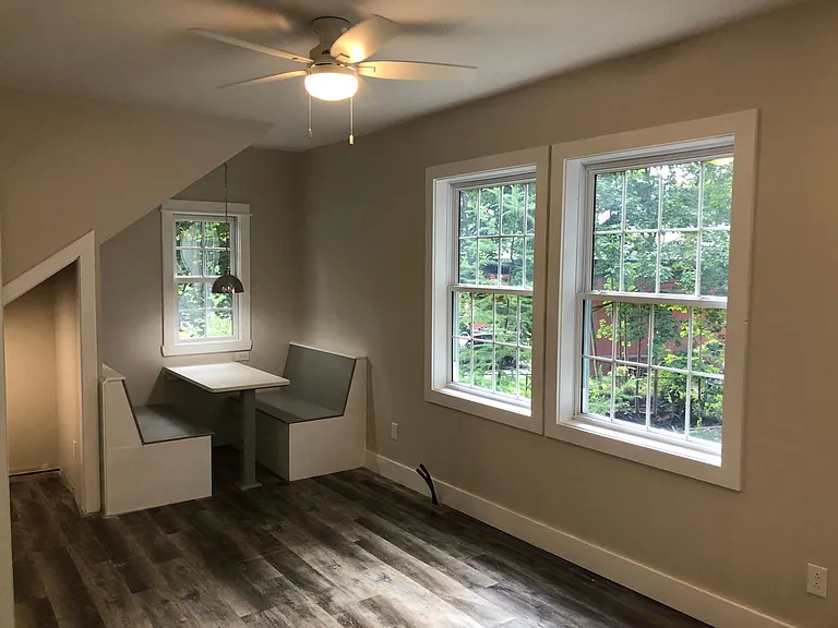 Huge windows overlooking the back yard.