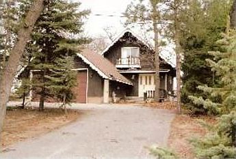 WATERFRONTLAKE HURON Charming 3 bedroom, 2 bath chalet offers sugar-sand beach and excellent swimmin