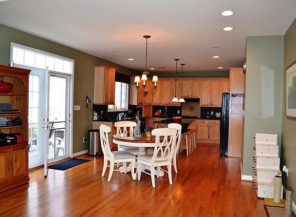 Wonderful open floor plan with gleaming hardwoods,