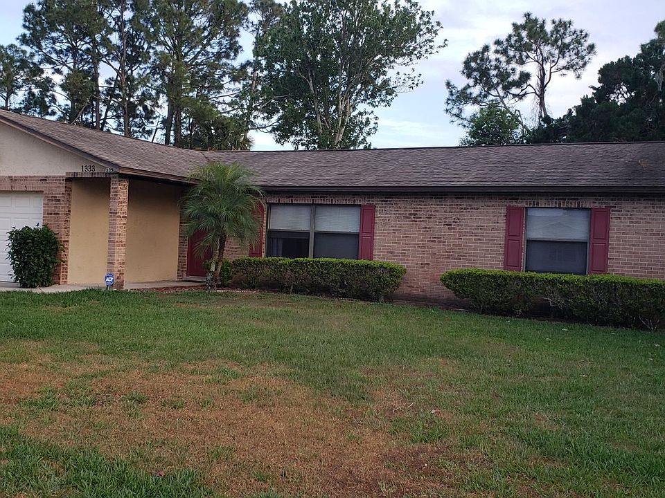1333 Dexter Dr. S., Port Orange FL. 32129-7406 w Security Light over garage/Driveway