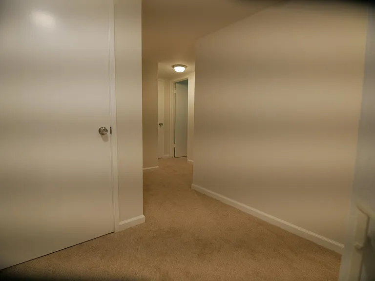 View at top of stairs towards bedroom 3