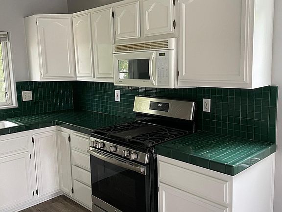Newly painted cabinets and new stove
