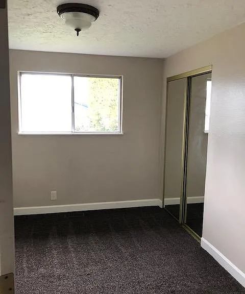 This is the first bedroom with is the second door on the right. It is larger than it looks in this pic.
