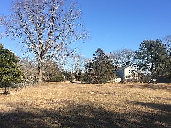 very back looking at house