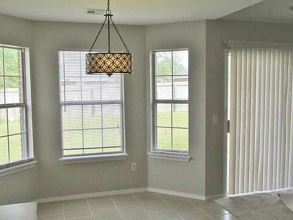 Dining area from the kitchen. Nice view into the back yard.