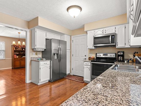 3rd image of 8760 Stonehenge Dr NW