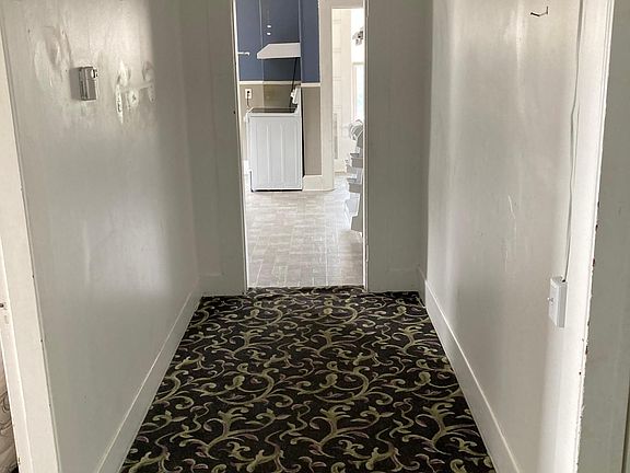 Hallway leading to kitchen