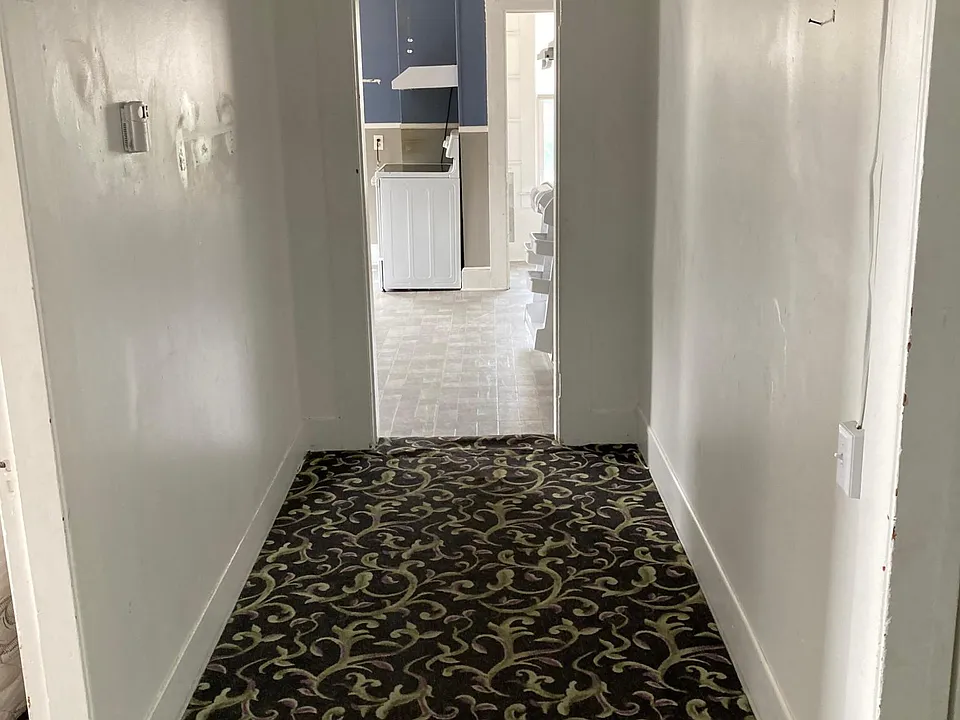 Hallway leading to kitchen