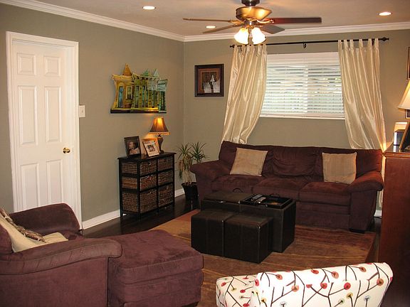 Indoor laundry room through door in this beautiful den!