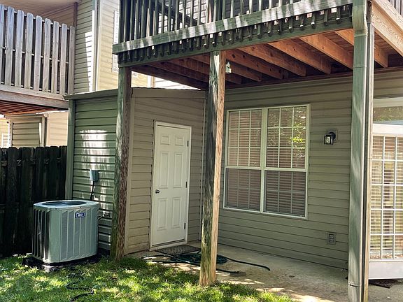 BACKYARD WITH FENCE AND NEW SOD.