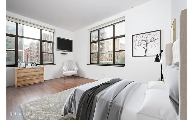 Sold by Douglas Elliman | media 18