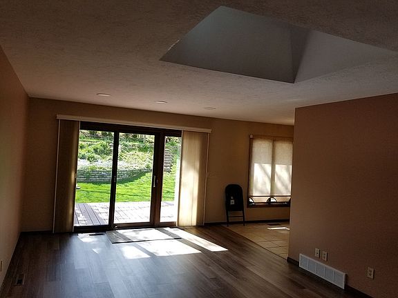 Family room w/skylight view backyard