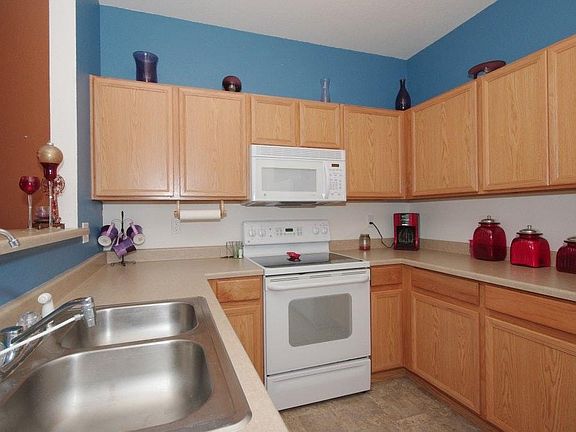 kitchen with lots of cabinets and big pantry