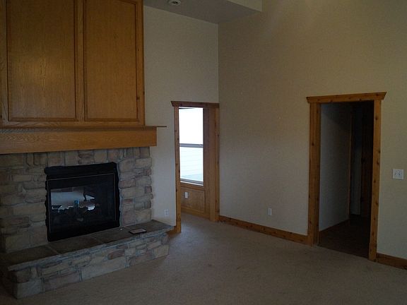Living room oak paneling and shelving